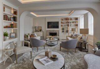 The bright sitting room at our Knightsbridge square project. The client wanted a sociable space with lots of seating, a concealed office (its hidden in the shelving unit shown on the left of the image) previously this space was very dark but now it is so inviting. #luxinteriors #livingroom #sittingroom #luxurylifestyle #luxuryinteriors #fireplace 📷 @raymain57
